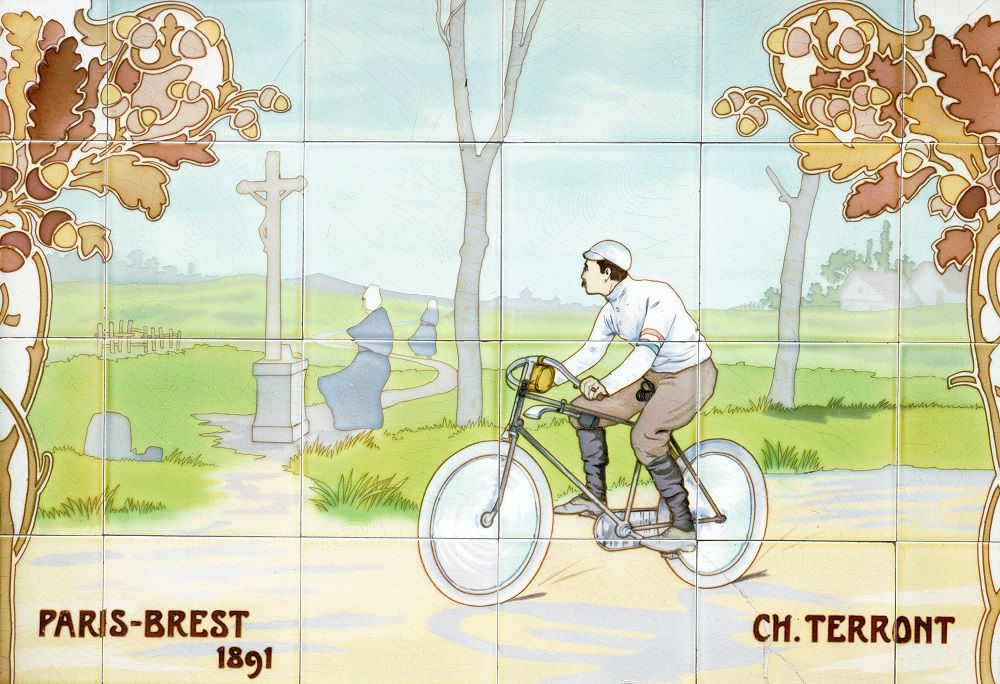 Art Nouveau style ceramic, illustrating the victory of Charles Terront on removable tires. The pilot is in the saddle, pedaling his bike in a countryside landscape.