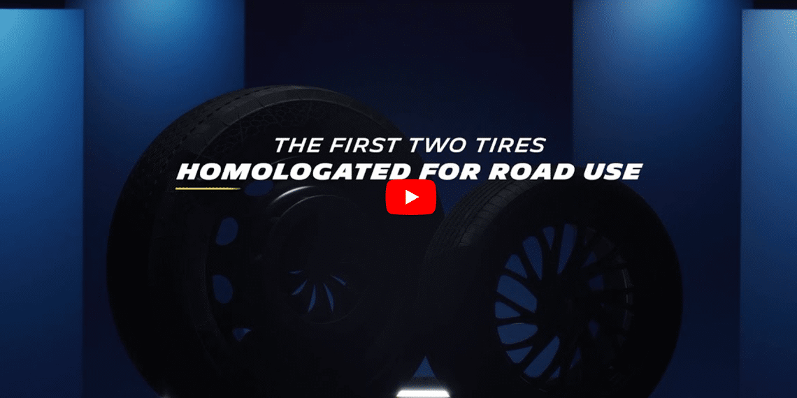 two tyres on blue background